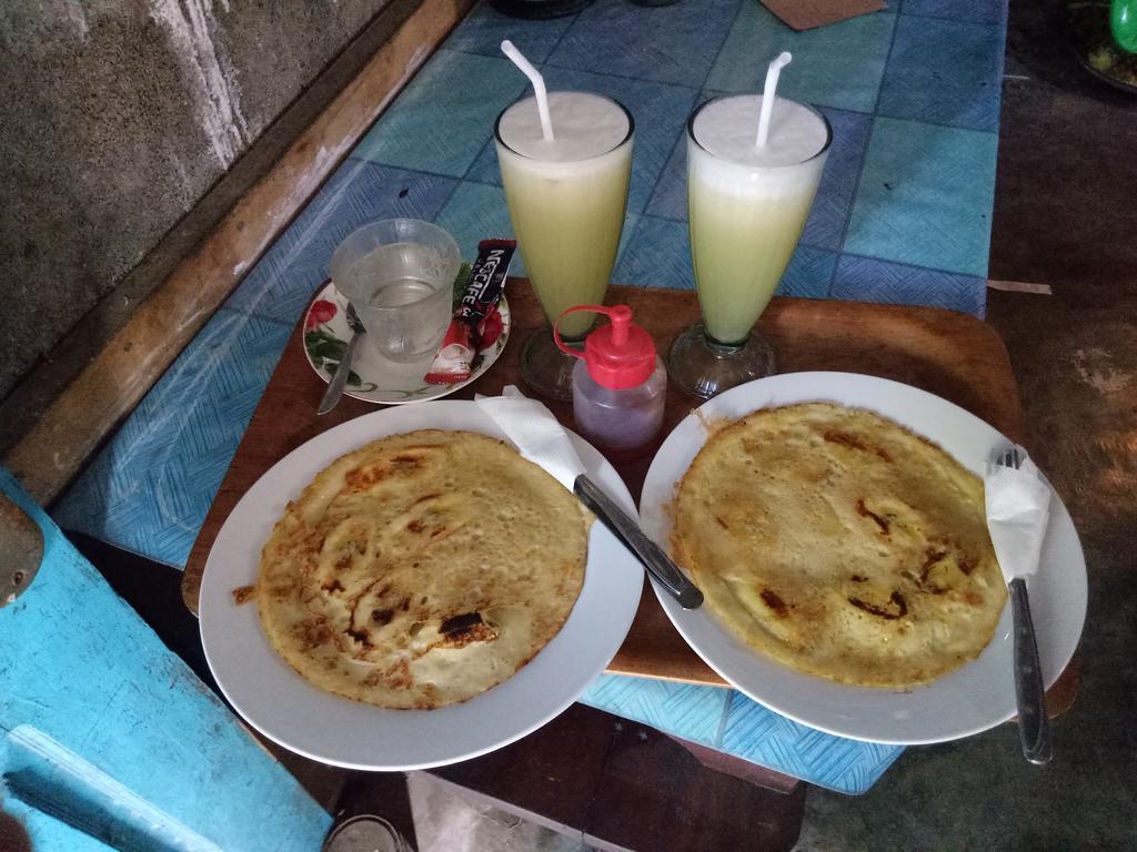 Aladdin Homestay Гили Еър Екстериор снимка